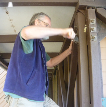 Martin preparing the bolts for painting